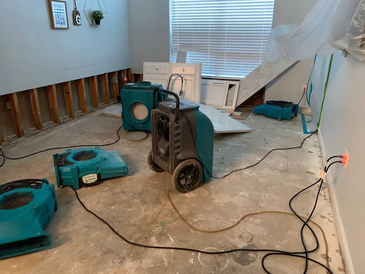 Dehumidifier in flood-cut room for Water Damage Restoration in Columbia